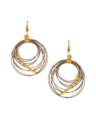 Loops of gold-tone twin and brass earrings on a white background.