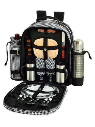 Open view of the backpack showing plates, silverware, cutting board, utensils, napkins, and a corkscrew.