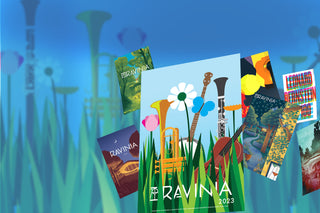 An assortment of Ravinia posters from over the years, against a blue background with grass in the foreground.