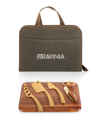 A green zippered canvas bag with RAVINIA on it above, and a cutting board with cheese knives and a corkscrew on it below.
