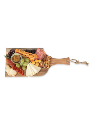 A wood plank covered with meats and cheeses, with only the handle full visible.