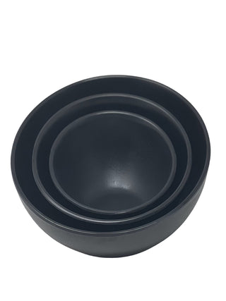 Three black bowls stacked in each other.