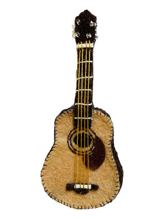 A felt ornament of an acoustic guitar.