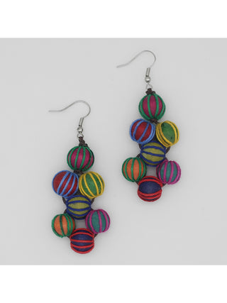 Earrings featuring intricately wrapped beads in a gorgeous blend of bright colors, hanging elegantly from a French wire.