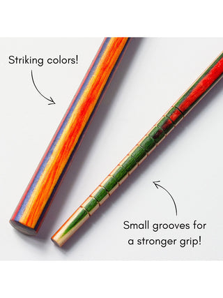 Close-up of the colorful wooden chopstick ends, with text Striking colors! and Small grooves for a stronger grip!