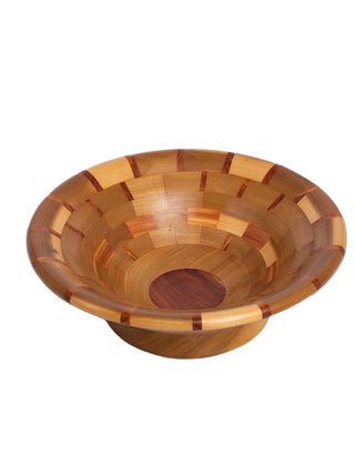 Overhead view of a segmented wooden bowl in different shades of brown.