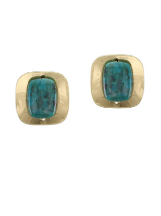Earrings with a lightly hammered and dished rounded brass square layered with large turquoise bead in the center.
