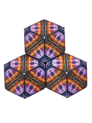 Three purple and orange cubes that make an interesting design together.