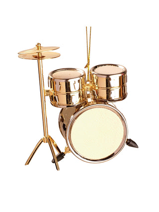 An ornament of a gold drum set containing a bass drum, two toms, and a hi-hat, and a gold cord for hanging.