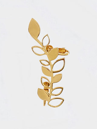 A gold earring with a leaf pattern, styled vertically.