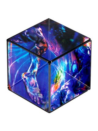 A cube featuring images of the jumbie cosmic surfer.