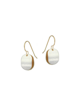 Wire earrings with two curved brass and silver ovals sitting back to back wit each other.