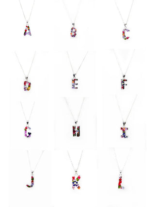 A series of images showing the initial flower pendants A-L on a sterling silver chain.
