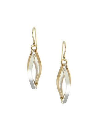 Gold and silver interlocking pointed hoops on a wire earring back.