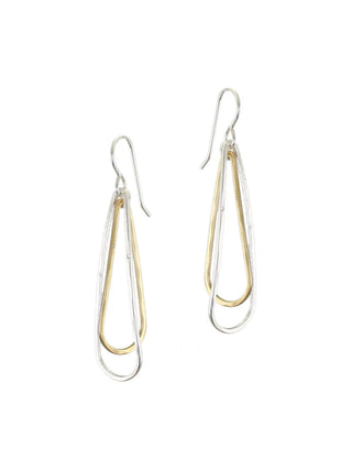 A pair of earrings made of two interlocking brass and silver long teardrop shaped rings.