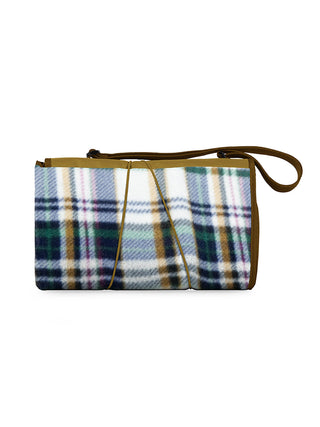 A beige and English plaid blanket tote, folded up to show the fleece plaid topside and the adjustable shoulder strap.