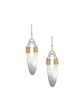 Wire earrings made of a long silver needle-like piece wrapped with brass wire.