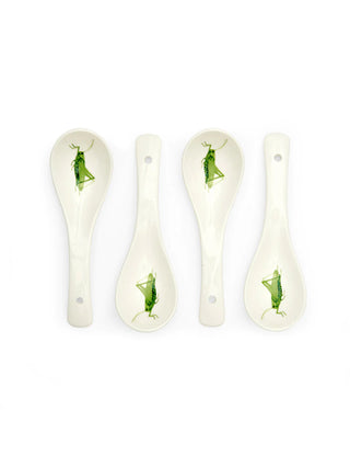 A set of 4 white ceramic spoons with grasshoppers printed at their mouths.