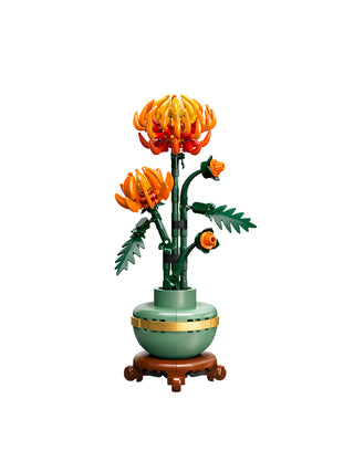 A LEGO Chrysanthemum in yellow, orange, and red, in a green LEGO vase and stand, on a white background.