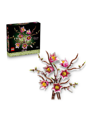 The LEGO Magnolia Branches box next to the assembled magnolia branches.