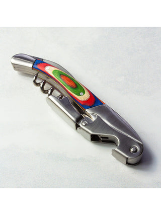 A folded wine opener with vibrant colors reminiscent of Marrakesh.