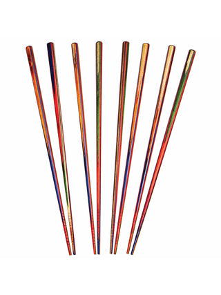 Four pairs of colorfully painted birch wood chopsticks, posed upright.