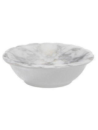 A dipping bowl with a marble pattern.