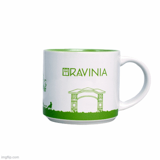 A spinning white mug with the word RAVINIA on it in green, with a rendition of Ravinia's Tyler Gate below it, also in green.