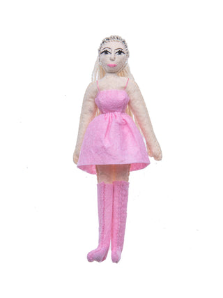 A felt ornament that looks like Ariana Grande in a pink dress.