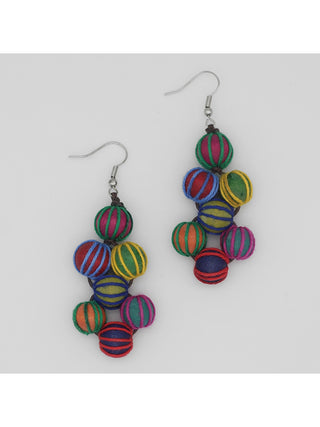 Earrings featuring intricately wrapped beads in a gorgeous blend of bright colors, hanging elegantly from a French wire. 