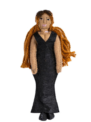 A felt ornament depicting Beyonce in a long black gown.