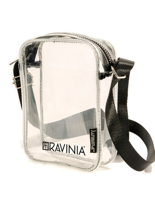 A transparent brick bag with a black strap and the Ravinia logo and name in black.