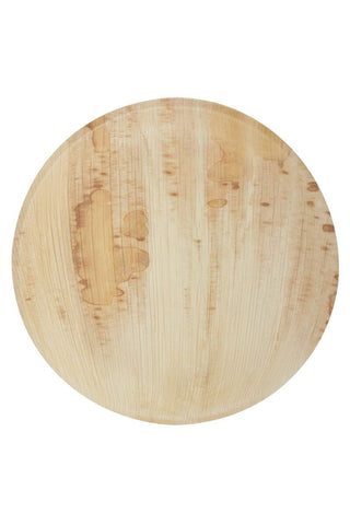 Overhead view of a round plate made of lightweight birch wood.