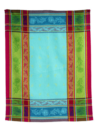 A woven Jacquard tea towel in Cezanne blue, with stripes of green, orange, and magenta framing and crossing on the sides. In each stripe, images of flowers are woven into the design.