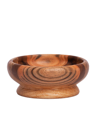 Profile view of a wooden bowl with a wide round base, in brown wood.