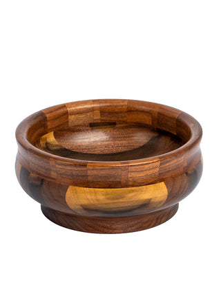 High angle view of a segmented wooden bowl in different shades of brown.