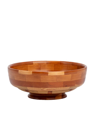 Profile view of a segmented wooden bowl in different shades of brown.