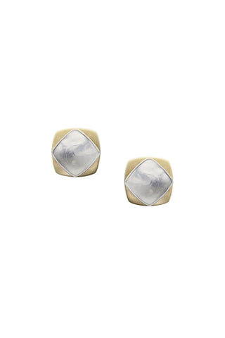 A domed, rounded brass square layered with a dished rounded silver square post earring. A pair are shown.