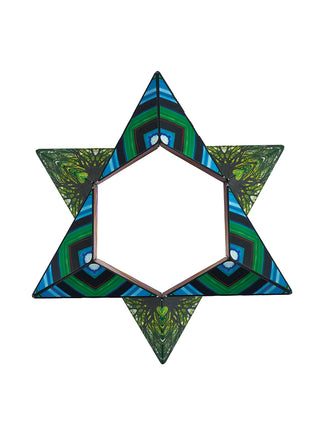 A star shape an opening in the middle, featuring a design with blue, green and trees with green leaves