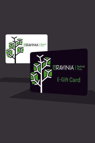 A gray background with a white card with a green rendition of a tree on it in the background, and the a black one in the foreground, with the words Ravinia Festival Shop E-Gift Card on it.
