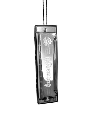 A silver ornament in the shape of a harmonica.