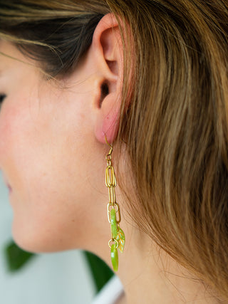 A model wearing the ivy earrings.