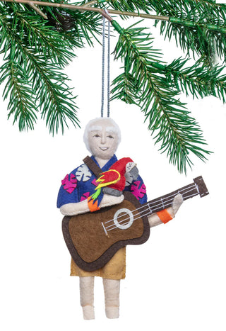 A felt ornament wiht the persona of musician Jimmy Buffet, complete with guitar, parrot, and tropical shirt.