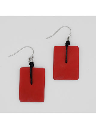 A pair of translucent red, rectangular earrings with silver-toned hooks. 