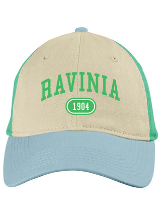 A blue, white and green washed chino hat with "RAVINIA 1904" on it.