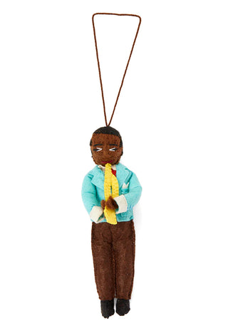 A felt ornament depicting Louis Armstrong playing the trumpet.