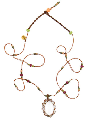 A micro-macrame necklace with a crystal quartz pendant and pink tourmaline and zirconium beads on a tobacco colored thread.