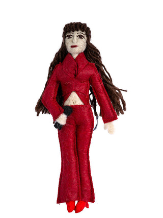 A felt ornament depicting the late singer Selena in a sparkly red dress, holding a microphone.