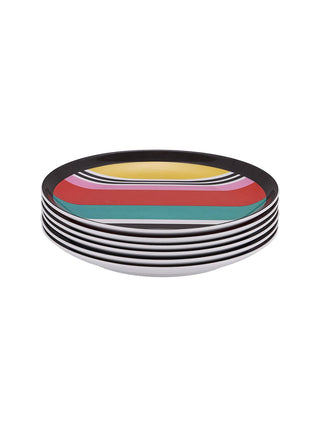 Six appetizer plates with striped patterns stacked atop each other.