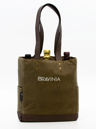 A khaki green bag with the Ravinia logo and wording in white, containing three bottles, with its leatherette handles extended above the bag.